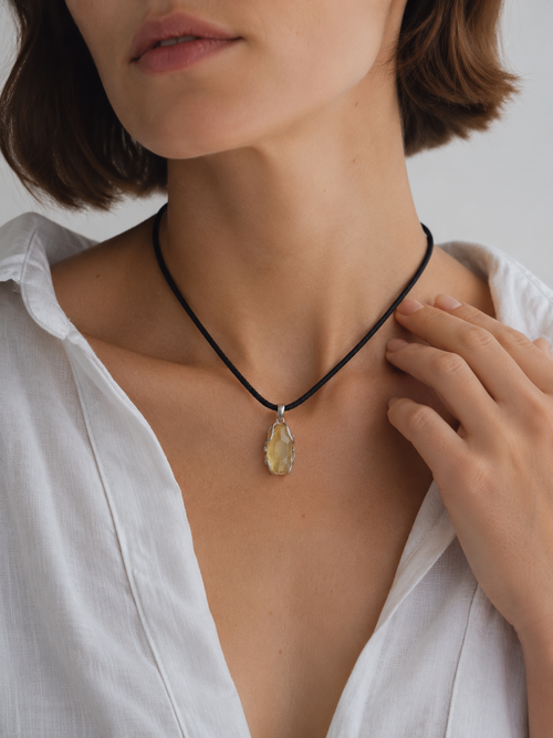 Woman wearing the VeilBond Sunlit Days citrine necklace